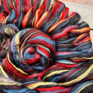 NEW BLEND!  Blue Faced Leicester and red yellow blue custom blend- m