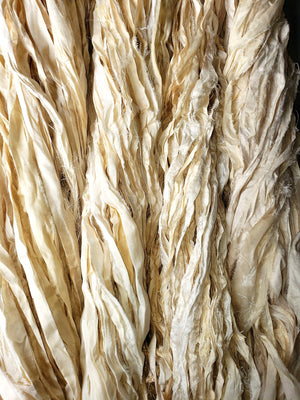 OFF WHITE/BEIGE/UNDYED SARI RIBBON YARN - EACH - 3.5 ounces about 45 to 50 yards.